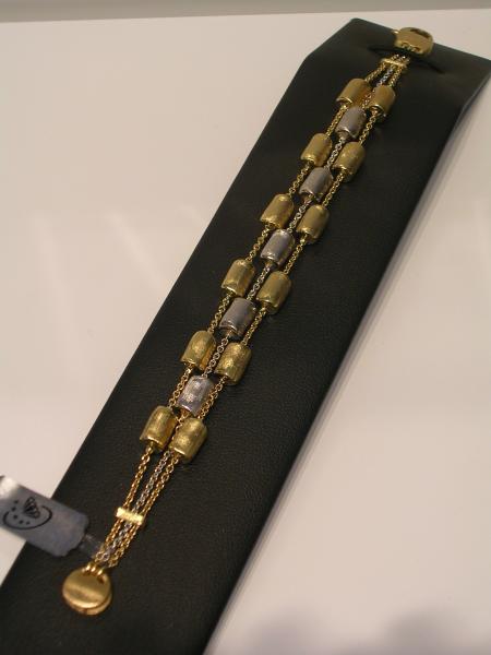 BRACCIALE  "MARCO BICEGO" DUE ORI 750/1000 A SEGMENTI BOMBATI SEMISATINATI - 