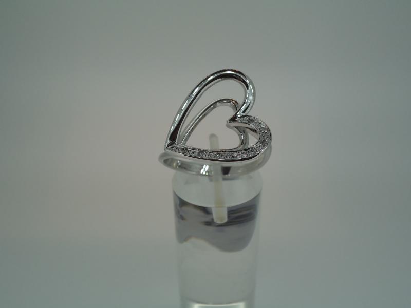 ANELLO ORO B. 750/1000 "COMETE" CUORE CON 8 DM DA 0.0005 CT CAD - 