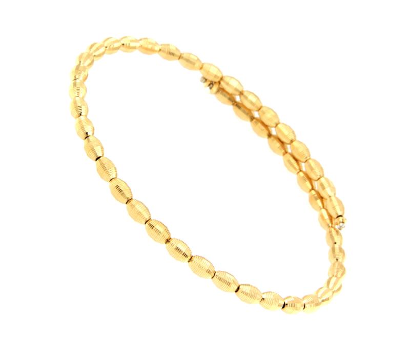 BRACCIALE ORO GIALLO 750/1000 SCHIAVA CON OVALI LAVORATI DIAM. CM. 5.8 - 