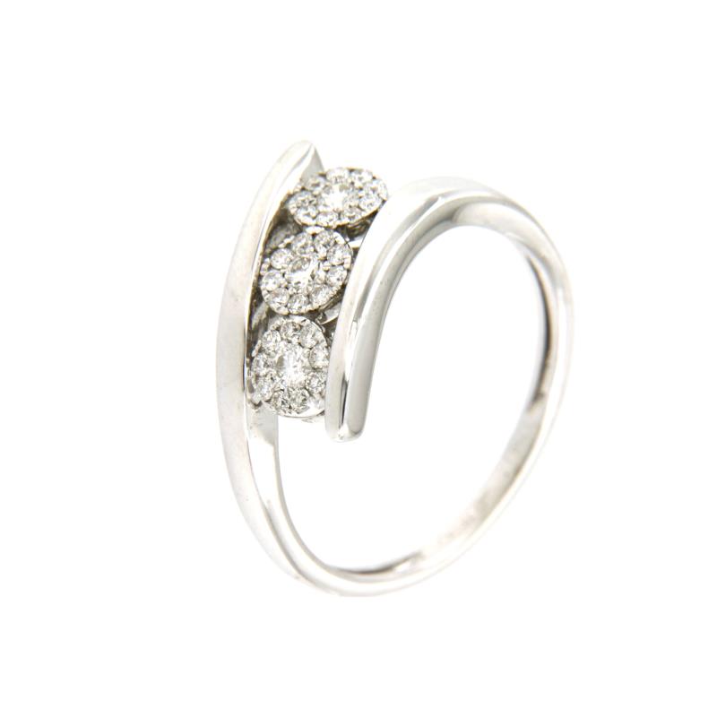 ANELLO ORO BIANCO 750/1000 TRILOGY A PAV&Egrave; CON DIAMANTI TAGLIO BRILLANTE CT 0.25 TOTALI G - SI1 - 